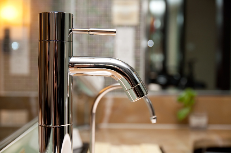 Leaking tap being repaired in Dartford